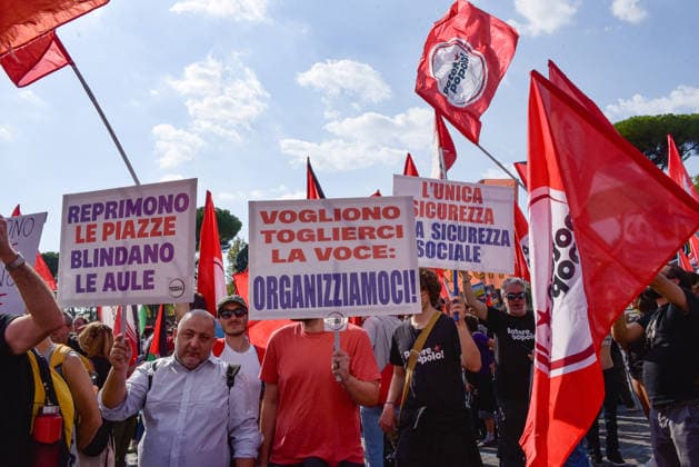 October 3, 2026, Rome, Rome, Italy: Activists and demonstrators hold banners and flags during the Potere al Popolo protest at Piazza Bocca della VeritÃ in Rome on October 3, 2026. Rome Italy - ZUMAn299 20261003_zip_n299_014 Copyright: xVincenzoxNuzzolesex