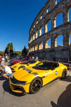 Ferrari Tour stops in Pula Luxury Ferrari sports cars taking part in a Ferrari Tour organized by Ineco Auto, are seen in front of the Roman Arena in Pula, Croatia, on October 3, 2026. While the drivers visit the ancient amphitheatre, local residents gather to watch and admire the vehicles.  SreckoxNiketic PIXSELL