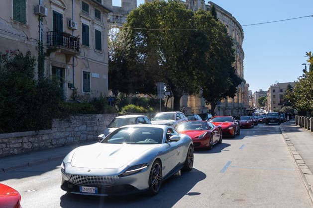 Ferrari Tour stops in Pula Luxury Ferrari sports cars taking part in a Ferrari Tour organized by Ineco Auto, are seen in front of the Roman Arena in Pula, Croatia, on October 3, 2026. While the drivers visit the ancient amphitheatre, local residents gather to watch and admire the vehicles.  SreckoxNiketic PIXSELL