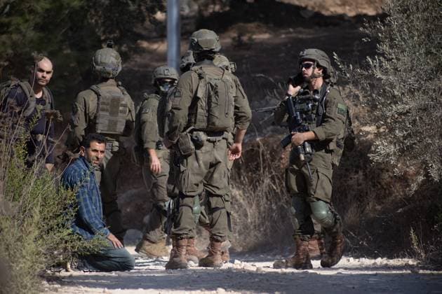Israeli Forces Arrested Palestinian Farmers Attempting To Harvest Olives Near Beita JABAL KAMAS, BEITA, PALESTINE OCTOBER 3, 2026: Israeli forces arrested seven Palestinian residents who were attempting to harvest their land in Jabal Kamas, near Beita. According to the provided information, nearly 20 Israeli settlers from the Mevaser Hashalom outpost, also known as Herald of Peace, attacked the farmers as they began working, while Israeli soldiers opened live fire. The military later arrested seven Palestinian residents and declared the area a closed military zone. The incident occurred as Palestinian farmers attempted to access and harvest their agricultural land near Beita. Nablus PS Copyright: x xRomanxLevinx xJNAxPressx