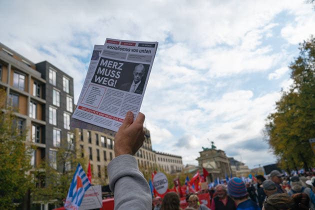 October 3, 2026, Berlin, Berlin, Germany: Thousands of people of all ages, including many school-age teenagers, marched through BerlinÃ¢â‚¬â ¢s Mitte district to protest mandatory military service, cuts to social services and increased spending on the arms industry. Berlin Germany  - ZUMAk201 20261003_zip_k201_008 Copyright: xNikosxKanistrasx