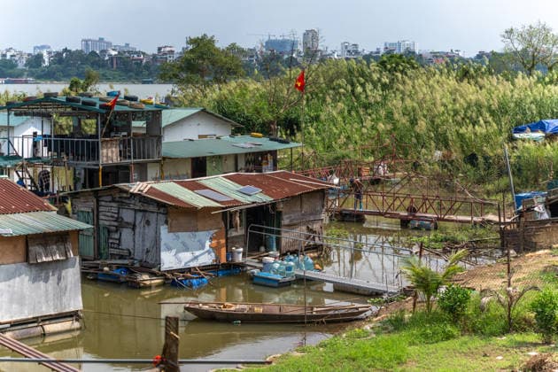 Floating homes offer a way of life adapted to recurrent flooding in Hanoi HANOI, VIETNAM - OCTOBER 3: Residents go about their daily lives in a floating village built in an area that is regularly affected by flooding, with homes designed to rise with changing water levels, as seen in Hanoi, Vietnam, on October 3, 2026. The floating homes allow residents to adapt to recurring floods while continuing to live and work in the area. Magdalena Chodownik Anadolu Hanoi Vietnam. Editorial use only. Please get in touch for any other usage.  Copyright: x2026xAnadoluxMagdalenaxChodownikx