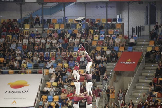 Human tower groups perform in the 30th Concurs de Castells competition in Tarragona TARRAGONA, SPAIN - OCTOBER 3: Members of human tower groups (colles) build intricate human towers (castells) during the competition section of the 30th Concurs de Castells at the Tarraco Arena Placa in Tarragona, Spain on October 3, 2026. The biennial event, recognized as UNESCO Intangible Cultural Heritage, gathers top teams from across Catalonia to construct towering multi-tiered human structures. Senhan Bolelli Anadolu Tarragona Spain. Editorial use only. Please get in touch for any other usage.  Copyright: x2026xAnadoluxSenhanxBolellix