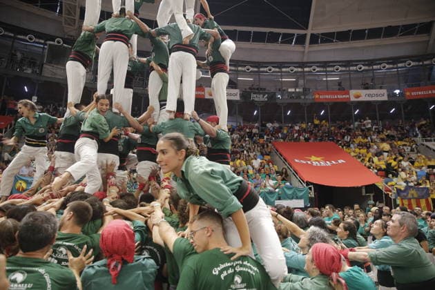 Human tower groups perform in the 30th Concurs de Castells competition in Tarragona TARRAGONA, SPAIN - OCTOBER 3: Members of human tower groups (colles) build intricate human towers (castells) during the competition section of the 30th Concurs de Castells at the Tarraco Arena Placa in Tarragona, Spain on October 3, 2026. The biennial event, recognized as UNESCO Intangible Cultural Heritage, gathers top teams from across Catalonia to construct towering multi-tiered human structures. Senhan Bolelli Anadolu Tarragona Spain. Editorial use only. Please get in touch for any other usage.  Copyright: x2026xAnadoluxSenhanxBolellix