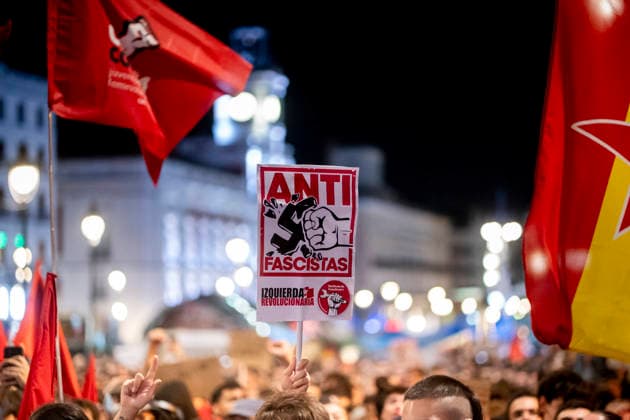 Protest Rally Against the Sol Camp in Madrid A group of people is demonstrating against the rally organized by Núcleo Nacional at Puerta del Sol on October 3, 2026, in Madrid, Spain. The platform Indignados por Espana is organizing the demonstration against the Sol encampment, in support of social and national housing, mass deportations, and the defense of national sovereignty following the invasion of Ceuta. OCTOBER 3, 2026. NUCLEO NACIONAL. PROTEST. HOUSING. FLAG. HOODED PROTESTERS. POLICE. ANTIFASCIST ACTION. ANTIFASCISTS. ON FOOT IN MADRID Madrid, Spain  Copyright: xA.xPÃ rezxMecax 7818915