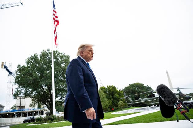 October 3, 2026, Washington, District Of Columbia, USA: United States President Donald J Trump speaks to members of the media before boarding Marine One on the South Lawn of the White House, in Washington, DC, USA, 3 October 2026. President Trump is traveling to Ohio for a rally as he campaigns with Republican Party candidates before midterm elections Washington USA - ZUMAs152 20261003_faa_s152_006 Copyright: xGraemexSloan-PoolxviaxCNPx