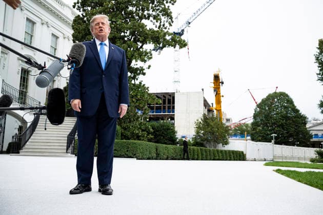 October 3, 2026, Washington, District Of Columbia, USA: United States President Donald J Trump speaks to members of the media before boarding Marine One on the South Lawn of the White House, in Washington, DC, USA, 3 October 2026. President Trump is traveling to Ohio for a rally as he campaigns with Republican Party candidates before midterm elections Washington USA  - ZUMAs152 20261003_faa_s152_008 Copyright: xGraemexSloan-PoolxviaxCNPx