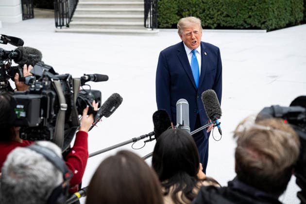 October 3, 2026, Washington, District Of Columbia, USA: United States President Donald J Trump speaks to members of the media before boarding Marine One on the South Lawn of the White House, in Washington, DC, USA, 3 October 2026. President Trump is traveling to Ohio for a rally as he campaigns with Republican Party candidates before midterm elections Washington USA  - ZUMAs152 20261003_faa_s152_010 Copyright: xGraemexSloan-PoolxviaxCNPx