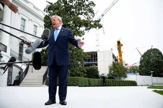 October 3, 2026, Washington, District Of Columbia, USA: United States President Donald J Trump speaks to members of the media before boarding Marine One on the South Lawn of the White House, in Washington, DC, USA, 3 October 2026. President Trump is traveling to Ohio for a rally as he campaigns with Republican Party candidates before midterm elections Washington USA  - ZUMAs152 20261003_faa_s152_024 Copyright: xGraemexSloan-PoolxviaxCNPx