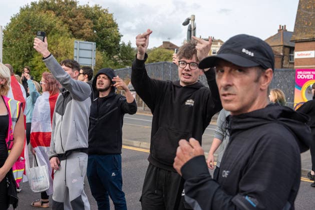 October 3, 2026, Dover, United Kingdom: Far-right protesters show gestures to the antifascist counter-protesters during a demonstration in Dover. Supporters of the English Defence League (EDL) gathered in Dover, UK to march through the town all the way to the harbour. English Defence League is an extreme far-right and Islamophobic organisation. It was founded by Tommy Robinson (pseudonym of Steven Yaxley-Lennon) in 2009. Dover United Kingdom - ZUMAs197 20261003_aaa_s197_259 Copyright: xKrisztianxElekx