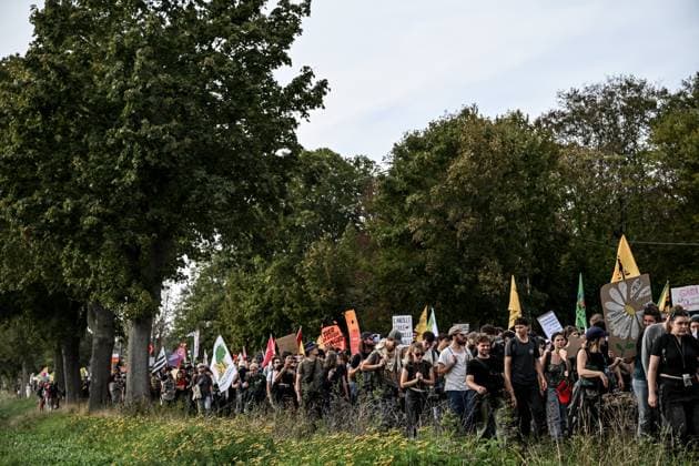 PROTEST AGAINST PESTICIDES PHOTOPQR OUEST FRANCE Martin ROCHE Saint Pierre la Garenne October 3, 2026 This Saturday, October 3, 2026, a protest against pesticides is being held in Saint-Pierre-la-Garenne, Eure, Normandy. In the massive procession, farmers, patients, healthcare workers, and citizens demanded the closure of production sites such as Syngenta’s. The rally was organized by an unprecedented coalition: the Confédération paysanne, Les Soulèvements de la Terre, the association Cancer Colère, and the Collectif de soutien aux victimes des pesticides de l’Ouest (CSVPO). Photographer: Martin ROCHE, Ouest France. Saint Pierre la Garenne, October 3, 2026. On Saturday, October 3, 2026, a protest against pesticides was held in Saint-Pierre Copyright: xPHOTOPQR OUESTxFRANCE MAXPPPxMartinxROCHEx 20261004OFR7240 20261004OFR7240