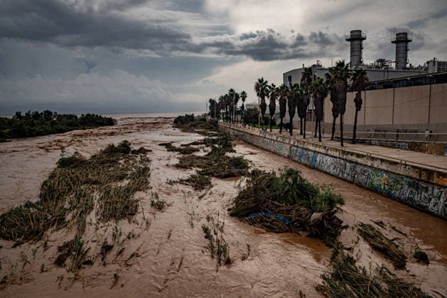 October 4, 2026, Sant Adria Del Besos, Barcelona, Spain: The mouth of the Besos River, north of Barcelona, is swollen and laden with sediment after a night of torrential rain across Catalonia. The storm brought exceptional rainfall to the Barcelona metropolitan area, with more than 200 litres per square metre recorded in parts of the region. The Besos rose sharply overnight, prompting authorities to warn of an imminent risk of flooding. Sant Adria Del Besos Spain - ZUMAb137 20261004_fap_b137_008 Copyright: xJordixBoixareux