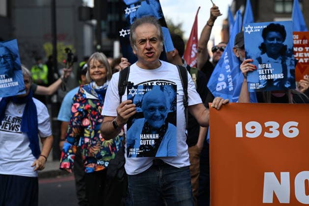 October 4, 2026, London, London, UK: London, UK. Demonstrators representing the Jewish Block take part in a march and rally to mark the 90th anniversary of The Battle of Cable Street in the East End of London. All over the country in 1936, Mosley s British Union of Fascists were chased off the streets by a strong working class who knew that the politics of hate and division offers no solutions. The Battle of Cable Street on 4 October 1936 was by far the countryÃ¢â‚¬â ¢s biggest mobilisation against fascism. London UK  - ZUMAl94_ 20261004_zaf_l94_042 Copyright: xRayxTangx