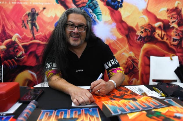Interview with video game programmer and designer John Romero Image from the interview with video game programmer and designer, John Romero, held as part of the San Diego Comic-Con in Málaga October 4, 2026, in Málaga, Andalusia, Spain Romero is considered one of the most influential figures in the video game industry. He is the co-creator of classics such as DOOM, Quake, Wolfenstein 3D, and Commander Keen. OCTOBER 4, 2026, in Málaga, Málaga, Spain  Copyright: xÃlexxZeax 7820177