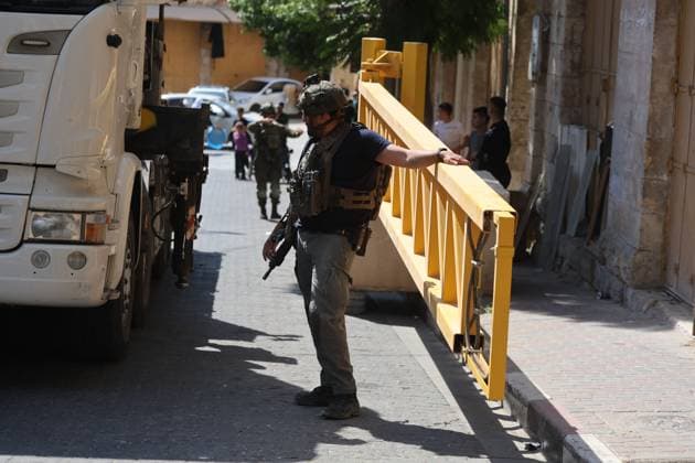 October 4, 2026, Hebron, Palestine, State of: HEBRON, OCCUPIED WEST BANK, OCTOBER 4, 2026: Newly installed Israeli military gates are seen near entrances to Hebron s Old City as Israeli forces impose additional movement restrictions in the area. One of the new iron gates was installed in the Al-Zahid area, a key route connecting neighborhoods of the Old City and providing access toward the Ibrahimi Mosque. Local shop owner Badr al-Tamimi said the restrictions were affecting access to more than 1,000 commercial shops and over 500 homes in the area. Hebron Palestine, State of - ZUMAq101 20261004_zna_q101_074 Copyright: xMosabxShawerx