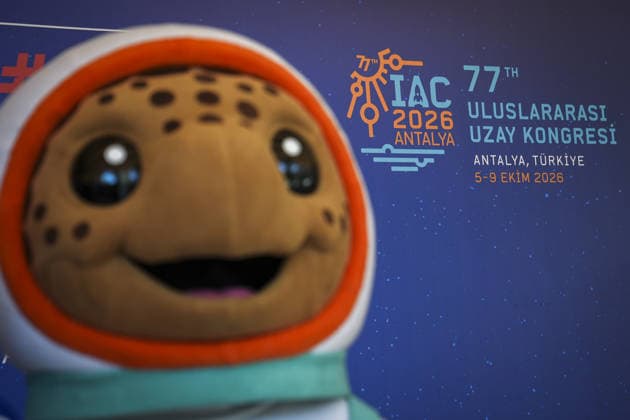 World’s largest annual gathering dedicated to space opens in Turkiye’s Antalya ANTALYA, TURKIYE - OCTOBER 05: Turquoise, the official Caretta caretta mascot of the 77th International Astronautical Congress (IAC), interacts with delegates during the opening day of the global summit at the NEST Convention Center in Antalya, Turkiye on October 05, 2026. Organized by the International Astronautical Federation (IAF), coordinated by the Turkish Ministry of Industry and Technology, and co-hosted by the Turkish Space Agency (TUA) and SAHA Istanbul, the event features the mascot welcoming space professionals and attendees from around the world. Beyza Comert Anadolu Antalya Turkey. Editorial use only. Please get in touch for any other usage.  Copyright: x2026xAnadoluxBeyzaxComertx