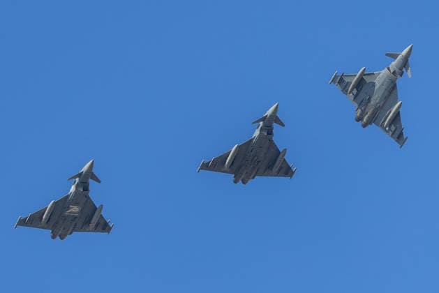Eurofighters at Nuremberg Airport: German Air Force Conducts Dispersed Operation Drill, Nuremberg, October 5, 2026: Three German Air Force Eurofighter Typhoons fly in formation against a cloudless sky. The German Air Force is conducting tests at the airport to see how Eurofighters and military personnel can operate temporarily from a civilian airport. Nuremberg Airport, Bavaria, Germany 20261005-1V9A0871-M4000