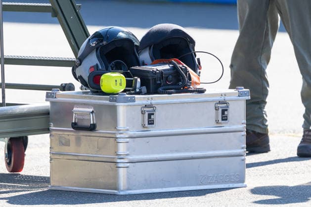 Eurofighters at Nuremberg Airport: German Air Force Conducts Dispersed Operation Drill, Nuremberg, October 5, 2026 Two helmets, a pair of yellow earplugs, and a radio with a coiled cable lie on an aluminum transport case at the airport. The German Air Force is testing there how Eurofighters and operational forces can temporarily operate from a civilian airpor 20261005-1V9A1304-M4000