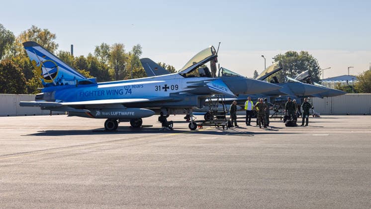 Eurofighters at Nuremberg Airport: German Air Force Conducts Dispersed Operation Exercise, Nuremberg, October 5, 2026. Several German Air Force Eurofighters are parked on the tarmac at the airport, with aircraft 31 09 in its special Fighter Wing 74 livery in the foreground. As part of the Dispersed Operation ex 20261005-286A0166-M4000