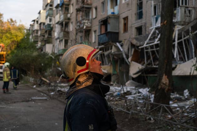 Russian missile attack on Ukraine s Kharkiv KHARKIV, UKRAINE - OCTOBER 5: Firefighters and emergency service workers operate at the site of a residential building struck by a guided bomb in Kharkiv, Ukraine on October 5, 2026. A guided bomb hit a residential building, killing at least two people and injuring over 30 others. The strike destroyed several parked vehicles and damaged more than 40 surrounding houses, with search, rescue, and cleanup operations ongoing by police, firefighters, and volunteers. Carlo Bravo Anadolu Kharkiv Ukraine. Editorial use only. Please get in touch for any other usage.  Copyright: x2026xAnadoluxCarloxBravox