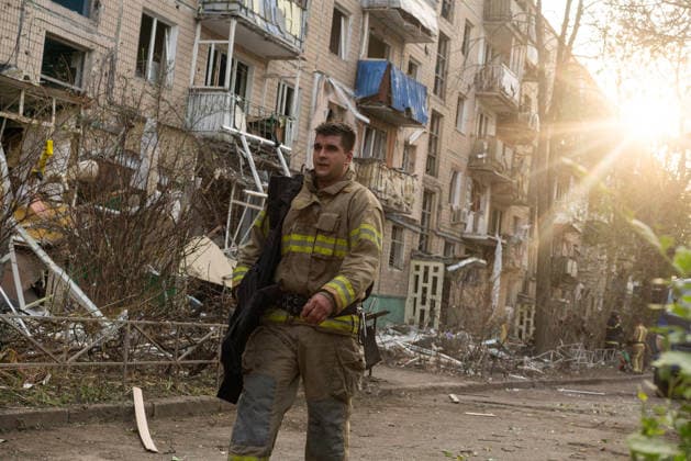 Russian missile attack on Ukraine s Kharkiv KHARKIV, UKRAINE - OCTOBER 5: Firefighters and emergency service workers operate at the site of a residential building struck by a guided bomb in Kharkiv, Ukraine on October 5, 2026. A guided bomb hit a residential building, killing at least two people and injuring over 30 others. The strike destroyed several parked vehicles and damaged more than 40 surrounding houses, with search, rescue, and cleanup operations ongoing by police, firefighters, and volunteers. Carlo Bravo Anadolu Kharkiv Ukraine. Editorial use only. Please get in touch for any other usage.  Copyright: x2026xAnadoluxCarloxBravox