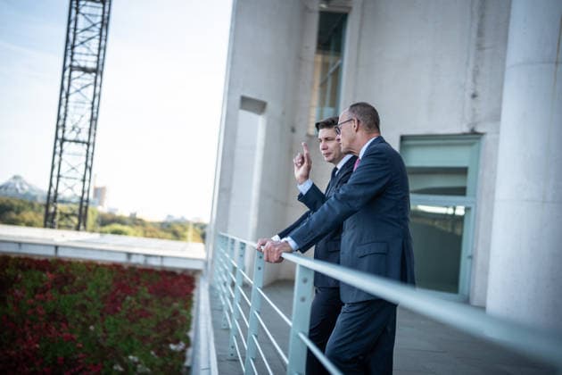 Chancellor Friedrich Merz with his guest Mindaugas Sinkeviciusius, Prime Minister of Lithuania, at the Federal Chancellery; on the terrace of the Federal Chancellery overlooking the Reichstag building, which houses the Bundestag; the Federal Chancellor receives the Prime Minister of the Republic of Lithuania at the Federal Chancellery, Berlin, Germany; Federal Chancellery
