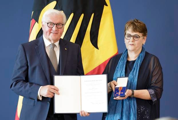 Federal President Frank Walter Steinmeier, Dr. Gudrun Heinrich, Rostock, Mecklenburg-Western Pomerania, Germany, Berlin, Official Residence at the Spreebogen; Federal President Frank Walter Steinmeier awarded the Order of Merit of the Federal Republic of Germany to 21 citizens on German Unity Day