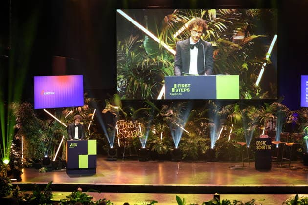 FIRST STEPS 2026: Laudatory Speech for the Karl Schirnhofer Award on stage at the FIRST STEPS 2026 awards ceremony at the Theater des Westens in Berlin Copyright: xEventpressxFuhrx