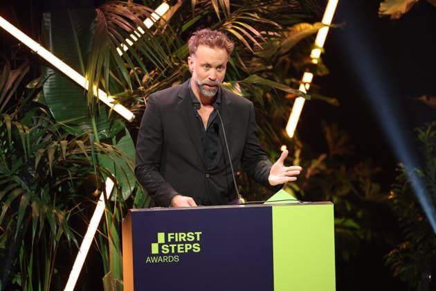 FIRST STEPS 2026 Medium-Length Feature Film: Erik Schmitt s Acceptance Speech at the FIRST STEPS 2026 Awards Ceremony on Stage at the Theater des Westens in Berlin Copyright: xEventpressxFuhrx