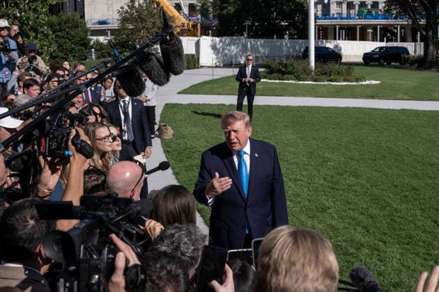 October 5, 2026, Washington, District of Columbia, United States: US President Donald Trump speaks with the White House press corps as he heads to Marine One on October 5, 2026. President Trump is heading to Nebraska to help Republican candidates in the upcoming midterm elections. Washington United States - ZUMAl312 20261005_znp_l312_034 Copyright: xAndrewxLeydenx