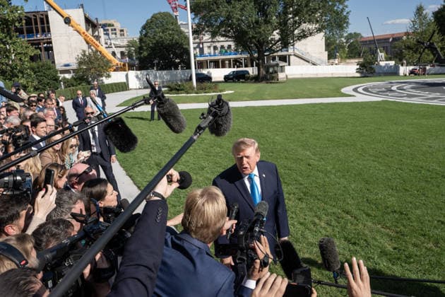 October 5, 2026, Washington, District of Columbia, United States: US President Donald Trump speaks with the White House press corps as he heads to Marine One on October 5, 2026. President Trump is heading to Nebraska to help Republican candidates in the upcoming midterm elections. Washington United States - ZUMAl312 20261005_znp_l312_036 Copyright: xAndrewxLeydenx