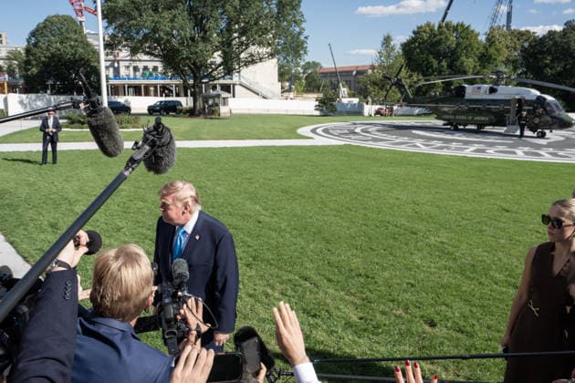 October 5, 2026, Washington, District of Columbia, United States: US President Donald Trump speaks with the White House press corps as he heads to Marine One on October 5, 2026. President Trump is heading to Nebraska to help Republican candidates in the upcoming midterm elections. Washington United States - ZUMAl312 20261005_znp_l312_037 Copyright: xAndrewxLeydenx