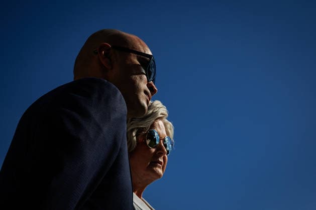 DC: President Trump Departs the White House White House Chief of Staff Susie Wiles (right) and Director of White House Oval Office Operations Walt Nauta (left) listen as President Donald Trump speaks to reporters on the South Lawn before departing the White House in Marine One on October 5, 2026 in Washington, D.C. Trump is heading to Grand Island, Nebraska where he will speak at a rally for Republican Senator Pete Ricketts. (Photo by Samuel Corum Pool ABACAPRESS.COM) Washington DC United States  Copyright: xPool ABACAx