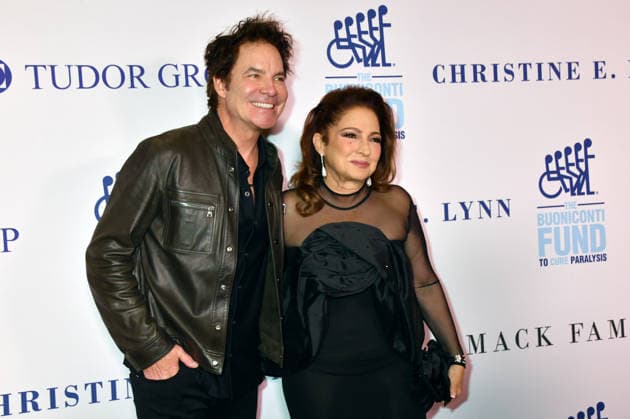 NEW YORK, NY - OCTOBER 5: Patrick Monahan and Gloria Estefan at the 41st Annual Great Sports Legends Dinner on October 5, 2026 at the New York Hilton in New York City. Copyright: xmpi099 MediaPunchx