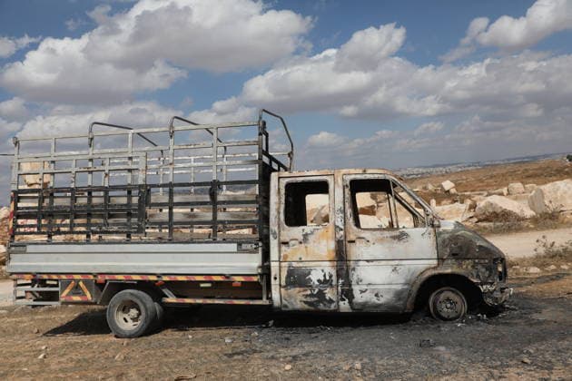 Palestinian Inspects Burned Vehicles Near al-Samu South of Hebron A Palestinian man inspects his burned vehicles near the town of al-Samu, south of Hebron, in the West Bank, on October 6, 2026, after an apparent arson attack believed to have been carried out by Israeli settlers. The incident comes amid an increase in settler attacks on Palestinians and their property in different areas of the West Bank. Photo by Mamoun Wazwaz apaimages Hebron West Bank Palestinian Territory 061026_Hebron_MW_00(19) Copyright: xapaimagesxMamounxWazwazx xapaimagesx
