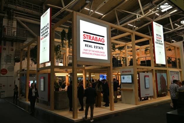 EXPO REAL 2026 is currently taking place at the Messe München exhibition grounds. It is Europe’s largest international trade fair for real estate, investment, and infrastructure. Photo: Züblin booth, Strabag. Ed Züblin AG, headquartered in Stuttgart, is Germany’s leading construction company in building construction and civil eng