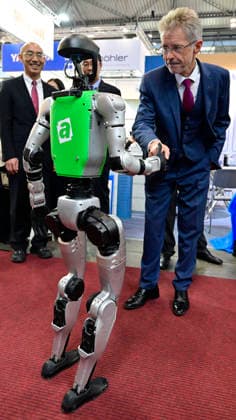 Czech Senate President Milos Vystrcil shake hands with a humanoid robot at opening of the 67th International Engineering Fair, which begins at Vystaviste 1 exhibition grounds in Brno, Czech Republic, on October 6th, 2026. International Fair of Machine Tools and Forming Machines IMT, International Welding Engineering Fair Welding, International Fair of Plastics, Rubber and Composites Plastex, International Fair of Surface Treatment Technologies Profintech and International Foundry Fair Fond-Ex also start. (CTKxPhoto VaclavxSalek) CTKPhotoP2026100605274  CTKPhotoP2026100605274