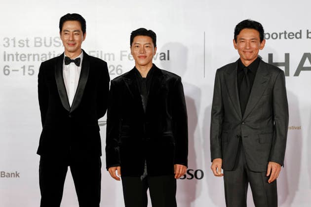 stars gather at busan international film festival in south korea (L-R) South Korean actors Zo In-sung, Eum Moon-seok and Hwang Jung-min pose for photographs during a photocall ahead of the opening ceremony of the 31st Busan International Film Festival (BIFF) at the Busan Cinema Center in Busan, South Korea, on October 06, 2026. Busan South Korea  Copyright: xMatrixxImages JungxUi-Chelx