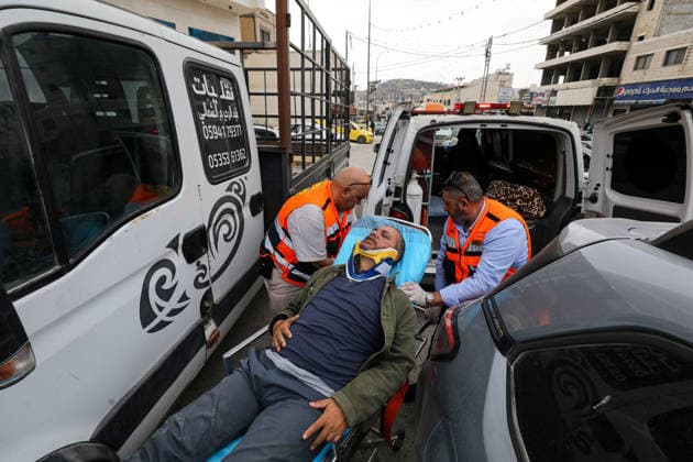 Four Palestinians injured in attacks by Israeli settlers in Nablus NABLUS, WEST BANK, PALESTINE - OCTOBER 6: Agence France-Presse (AFP) photojournalist Jaafar Ashtiyeh, who is injured at the scene, is taken to hospital by ambulance following an Israelis attack Palestinian farmers harvesting olives on their land in the town of Aqraba, south of Nablus, West Bank, Palestine, on October 6, 2026. Nedal Eshtayah Anadolu Nablus West Bank. Editorial use only. Please get in touch for any other usage.  Copyright: x2026xAnadoluxNedalxEshtayahx