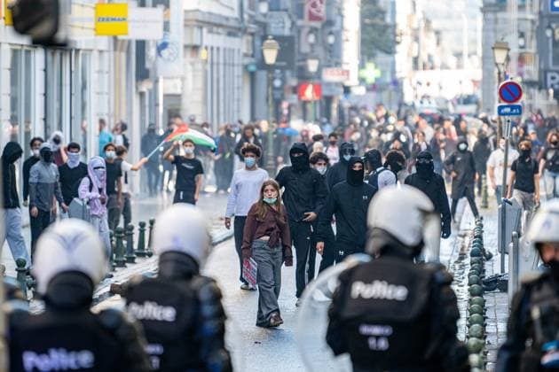 Youths confront riot police as students gather outside several schools in Liege during a protest against education reforms and budget cuts, on Tuesday 6 October 2026. Yesterday police arrested 16 people after the protests turned violent. The protests in French-speaking Belgium have been ongoing for months, following a series of reforms and budget cuts introduced by the French Community Government.  JONASxROOSENS 188939164