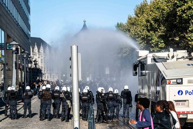 Riot police deploys a water cannon as students gather outside several schools in Liege during a protest against education reforms and budget cuts, on Tuesday 6 October 2026. Yesterday police arrested 16 people after the protests turned violent. The protests in French-speaking Belgium have been ongoing for months, following a series of reforms and budget cuts introduced by the French Community Government.  JONASxROOSENS 188939268