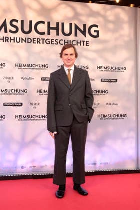 Lars Eidinger attends the premiere of *Heimsuchung: The Beloved* at Kino International on October 6, 2026, in Berlin, Germany. *Heimsuchung: The Beloved* premiere in Berlin, Germany