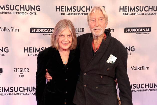 Angela Winkler and Wigand Witting attend the premiere of *Heimsuchung: The Beloved* at Kino International on October 6, 2026, in Berlin, Germany. *Heimsuchung: The Beloved* premiere in Berlin, Germany