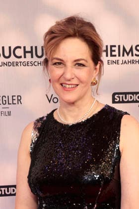Martina Gedeck attends the premiere of *Heimsuchung: The Beloved* at Kino International on October 6, 2026, in Berlin, Germany. *Heimsuchung: The Beloved* premiere in Berlin, Germany