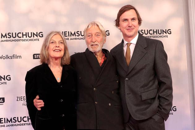Angela Winkler, Wigand Witting, and Lars Eidinger attend the premiere of *Heimsuchung: The Beloved* at Kino International on October 6, 2026, in Berlin, Germany. *Heimsuchung: The Beloved* premiere in Berlin, Germany