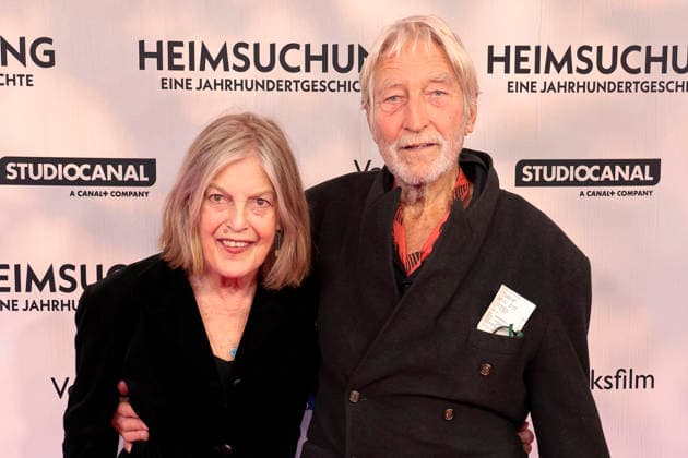 Angela Winkler and Wigand Witting attend the premiere of *Heimsuchung: The Beloved* at Kino International on October 6, 2026, in Berlin, Germany. *Heimsuchung: The Beloved* premiere in Berlin, Germany