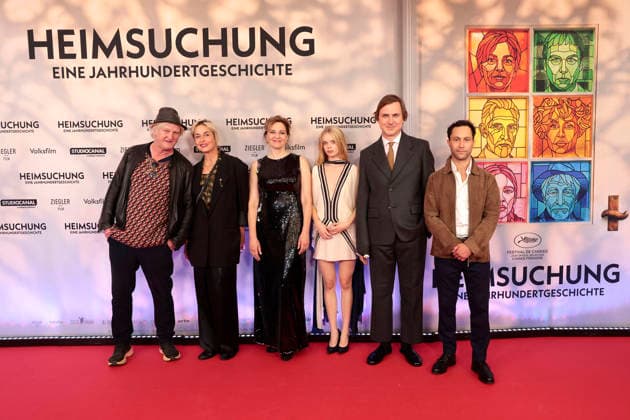 Detlev Buck, Susanne Wolff, Martina Gedeck, Maria Matschke Engel, Lars Eidinger, and Ludwig Trepte attend the premiere of *Heimsuchung: The Beloved* at Kino International on October 6, 2026, in Berlin, Germany. *Heimsuchung: The Beloved* premiere in Berlin, Germany