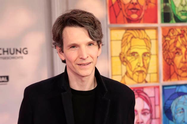 Sabin Tambrea attends the premiere of *Heimsuchung: The Beloved* at Kino International on October 6, 2026, in Berlin, Germany. *Heimsuchung: The Beloved* premiere in Berlin, Germany