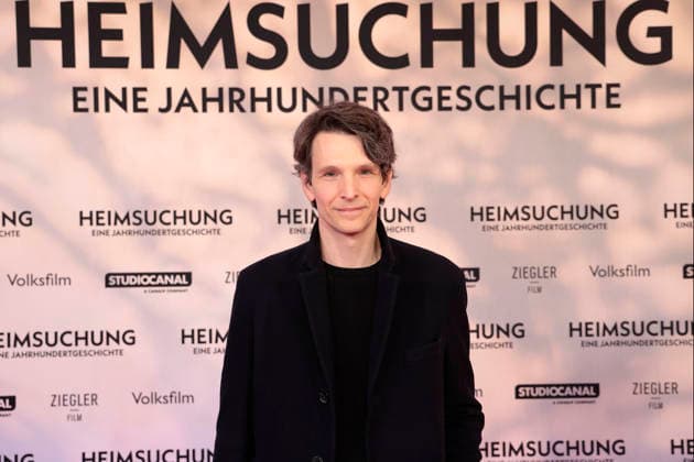 Sabin Tambrea attends the premiere of *Heimsuchung: The Beloved* at Kino International on October 6, 2026, in Berlin, Germany. *Heimsuchung: The Beloved* premiere in Berlin, Germany