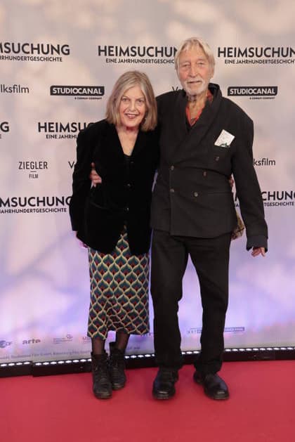 Angela Winkler and Wigand Witting attend the premiere of *Heimsuchung: The Beloved* at Kino International on October 6, 2026, in Berlin, Germany. *Heimsuchung: The Beloved* premiere in Berlin, Germany